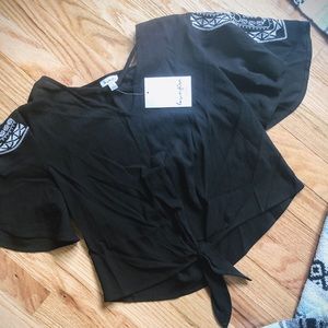Black embroidered front tie blouse